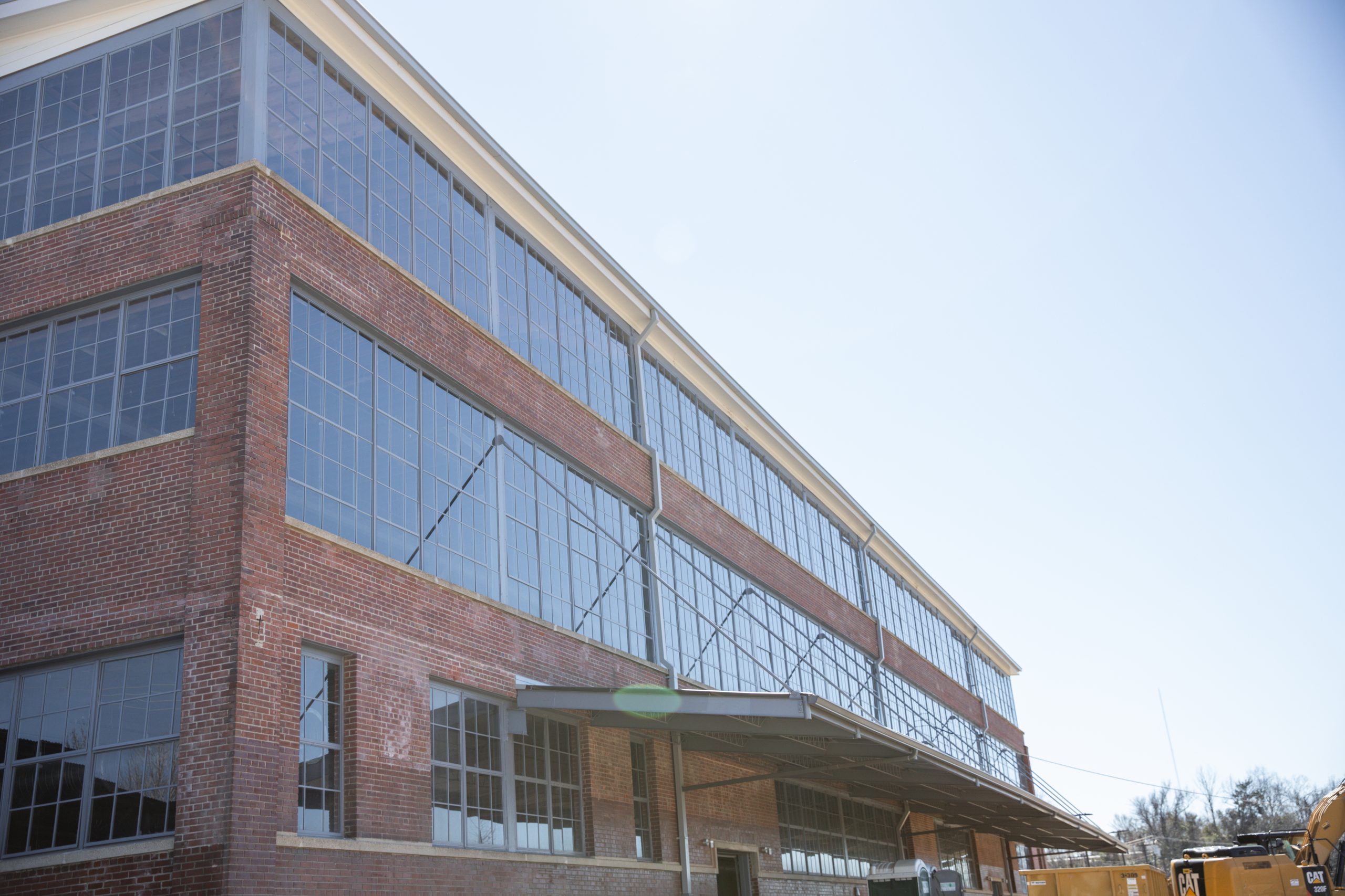 Commercial window tinting on a modern office building in Milwaukee