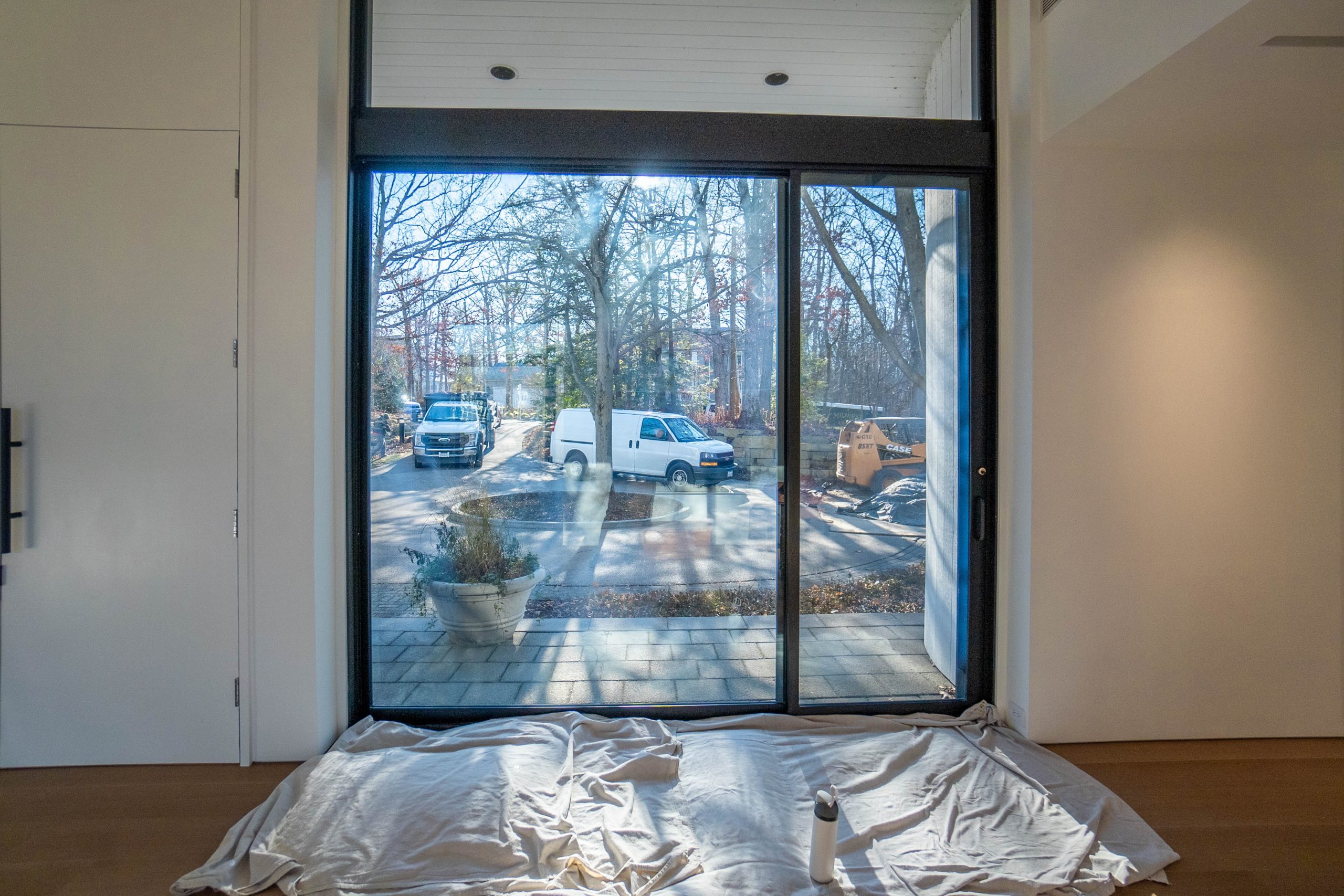Finished residential window tint on floor-to-ceiling windows in a Highland Park home near Chicago.